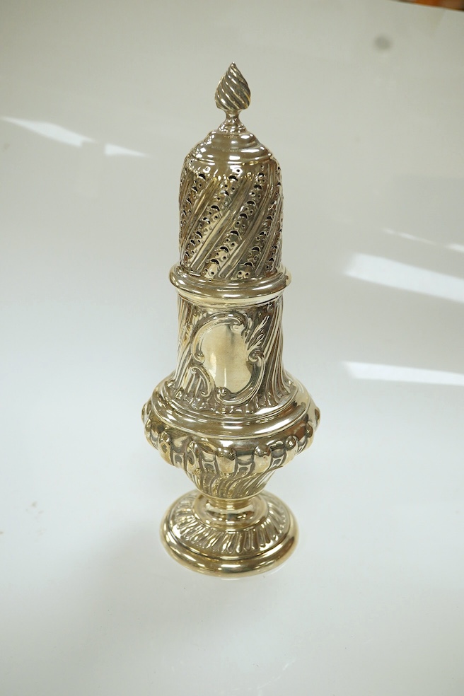 An Edwardian silver sugar caster, London, 1901, 22.6cm, together with a white metal box with hinged cover, gross weight 7.8oz. Condition - poor to fair